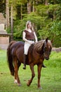 Woman riding her horse bareback Royalty Free Stock Photo