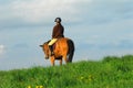 Woman riding horse