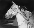 Woman riding horse Royalty Free Stock Photo