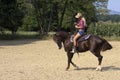 Woman riding a horse