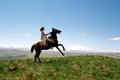 Woman riding horse in country Royalty Free Stock Photo