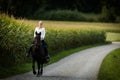 Woman riding a horse. Equestrian sport