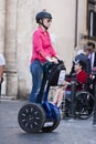 Woman riding segway