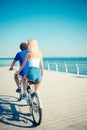 ?an and woman riding in tandem bicycle Royalty Free Stock Photo