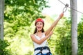 Woman riding on a zip line Royalty Free Stock Photo