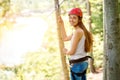 Woman riding on a zip line Royalty Free Stock Photo