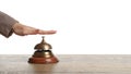 Woman ringing hotel service bell at table Royalty Free Stock Photo