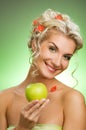 Woman with ripe green apple Royalty Free Stock Photo