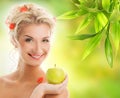 Woman with ripe green apple Royalty Free Stock Photo