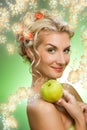 Woman with ripe green apple Royalty Free Stock Photo