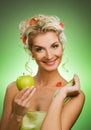 Woman with ripe green apple Royalty Free Stock Photo