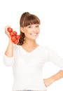 Woman with ripe tomatoes