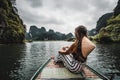 A woman on a river boat in Ninh Binh. Mountains of northern Vietnam. Royalty Free Stock Photo