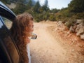 Woman on road trip traveling by rental car Royalty Free Stock Photo