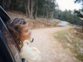 Woman on road trip traveling by rental car Royalty Free Stock Photo