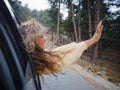 Woman on road trip traveling by rental car Royalty Free Stock Photo