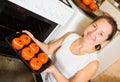 Woman roasting farci tomato