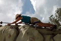 Woman rock climbing Royalty Free Stock Photo