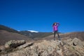 Woman on rock looking into distance in Madrid mountain Royalty Free Stock Photo