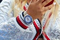 Woman with Rolex Yacht Master and silver sweater before Ermanno Scervino fashion show, Milan