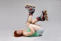 Woman on roller-skates lacing. Royalty Free Stock Photo