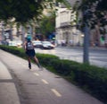 GIRL ROLLER SKATING IN THE CITY