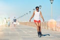 Woman, rollerskate and summer with hobby for active fitness or health for exercise. Training, fun and workout with lens