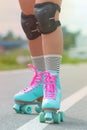 Woman rollerskater wearing knee protector pads Royalty Free Stock Photo