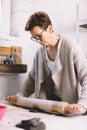 Woman rolling clay in pottery ceramics workshop Royalty Free Stock Photo