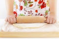 Woman rolling dough using rolling pin Royalty Free Stock Photo
