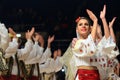 Woman in Romanian traditional outfit perform during dancesport competition Royalty Free Stock Photo