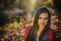 Woman in a romantic autumn scenery