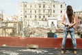 Woman on the roof of old building Royalty Free Stock Photo