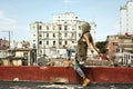 Woman on the roof of old building Royalty Free Stock Photo