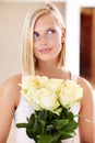 Woman, rose bouquet and eyes with face, holding and floral arrangement in house, confident and gift. Look, female model Royalty Free Stock Photo