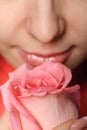 The woman with a rose closeup