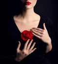 Woman with Rose Flower and Red Lips Make up over Black. Elegant Lady Fantasy Fine Art Close up Portrait. Beauty Model Hands Royalty Free Stock Photo