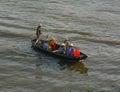 Woman rowing boat at Nga Nam floating market in Soc Trang, Vietnam