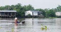 A woman rowing boat on the river in Tien Giang, Vietnam