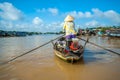 Woman rowing on boats