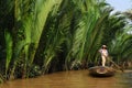 Woman rowing a gondola