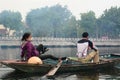 Woman rowing a touristic boat on Ngo river. Tam Coc. Ninh Binh. Vietnam Royalty Free Stock Photo
