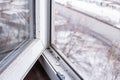 A woman in a rubber glove points to the mold. Plastic window and window sill in mold and dirt. Fungus and dampness at the wet Royalty Free Stock Photo