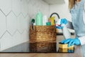 Woman in rubber gloves clean glass ceramic surface on induction stove