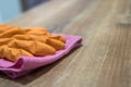 Woman in rubber gloves and cleaning the kitchen counter with sponge Royalty Free Stock Photo