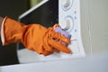 Cleaning microwave in the kitchen Royalty Free Stock Photo