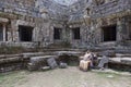 Woman at ruins of Angkor Wat in Cambodia