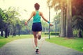 Runner athlete jumping rope at tropical park Royalty Free Stock Photo