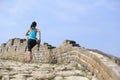 Woman runner athlete running on trail at chinese great wall Royalty Free Stock Photo