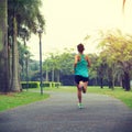 runner athlete running at tropical park Royalty Free Stock Photo